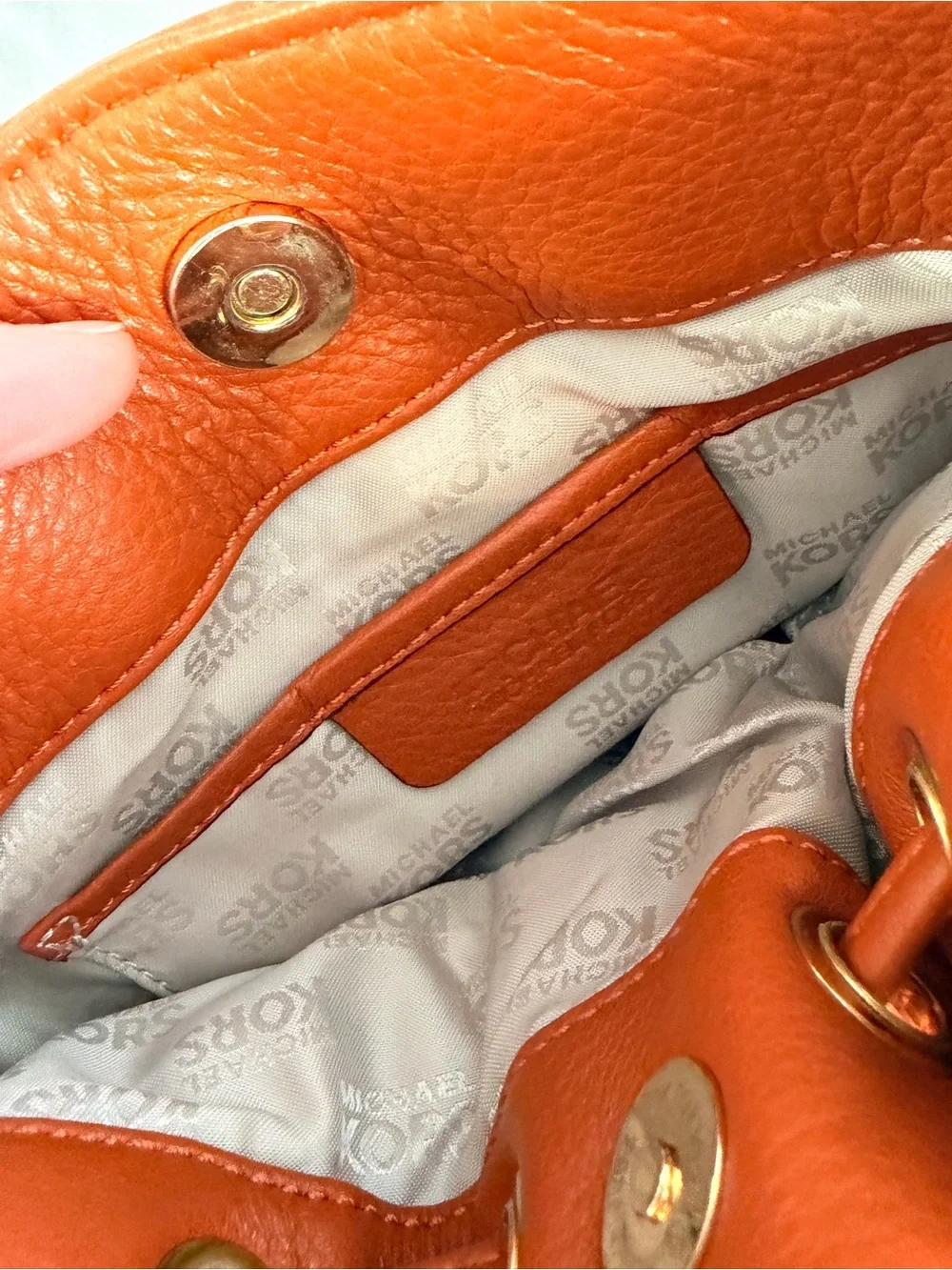 Michael Kors Orange Leather Bucket Crossbody